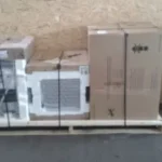 multiple large boxes strapped on wooden pallets ready for shipment